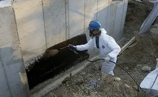 Professional waterproofing the exterior walls of the basement in Henderson, NV